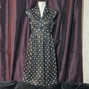 Vintage ‘60’s-‘70s black with rainbow colored flowers dress mabae it polyester
